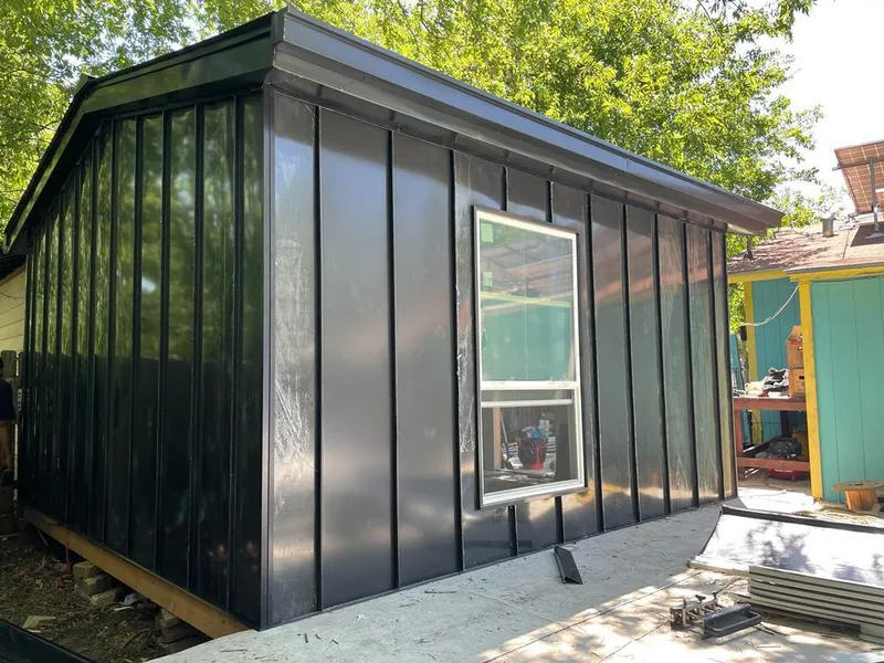 Black standing seam metal wall panels for Metal Roof Installation in Sitka